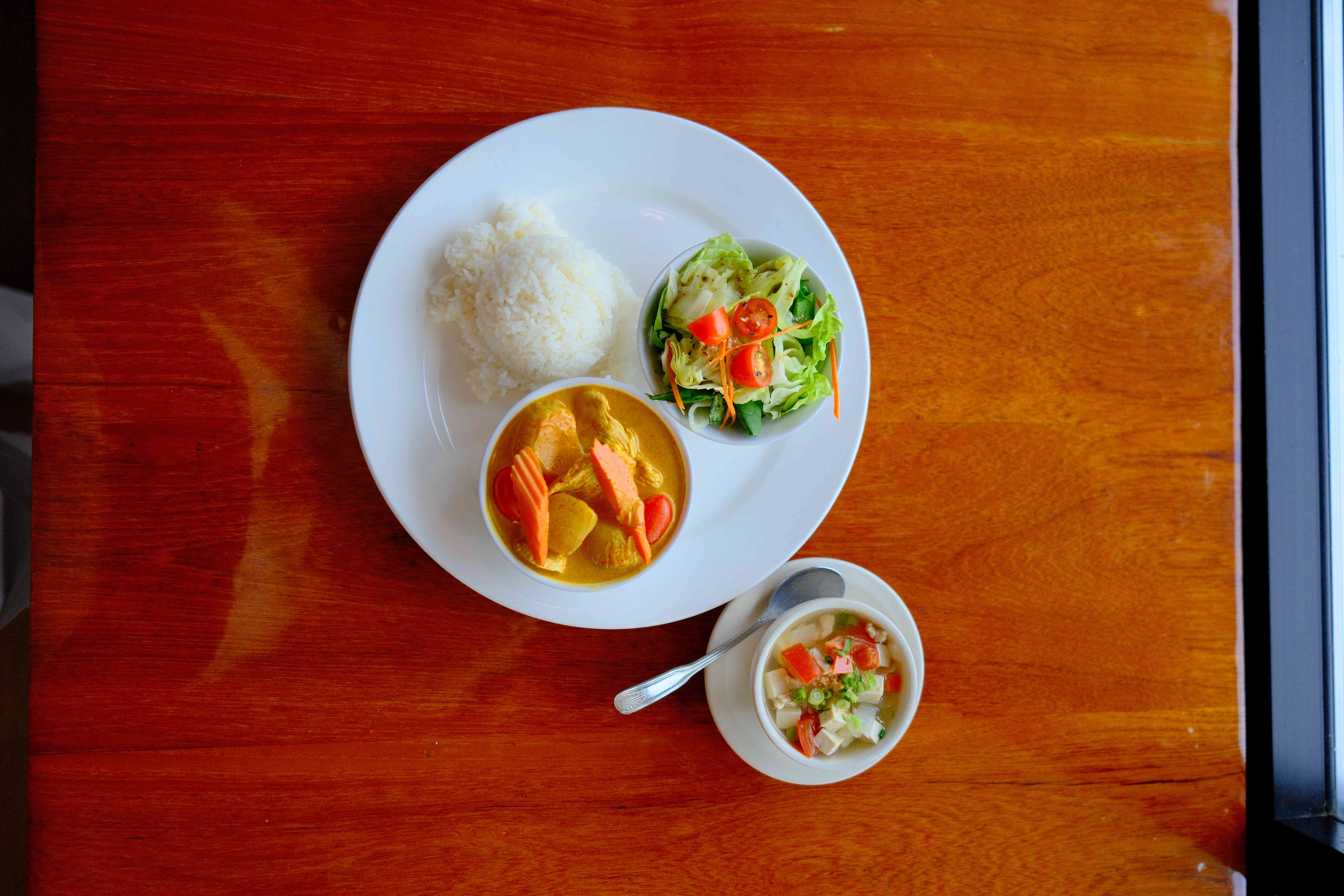 Colorful Thai curry and jasmine rice — Woodinville Thai takeout